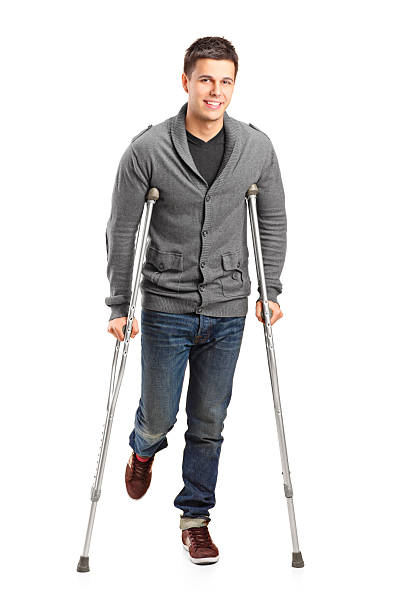 istock Injured young man on crutches 136380613