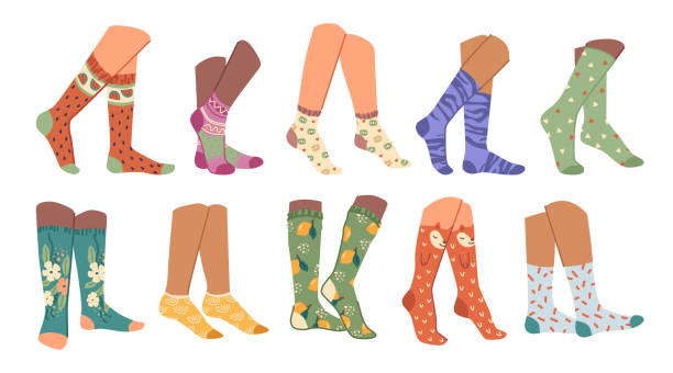 istock Legs, multiethnic male and female foot with funny doodle colored socks, trendy apparel flat cartoon set, fashion collection. Vector women and men leg in trendy feet in stylish sock pairs with pattern 1363808156