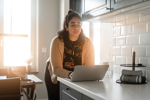 Some Working Getting Some Work Done At Home Stock Photo - Download Image Now - 30-34 ...