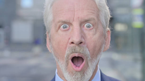 istock Face Close up of Old Businessman with Shocked Expression 1363809930