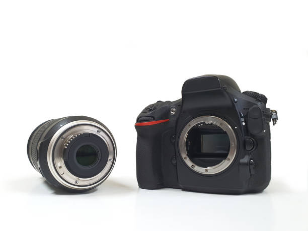 istock Digital camera with tele lens, professional isolated on white 1363810609