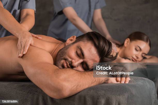 Spouses Resting At Relaxing Massage Stock Photo - Download Image Now - Massaging, Couple - Relationship, Two People