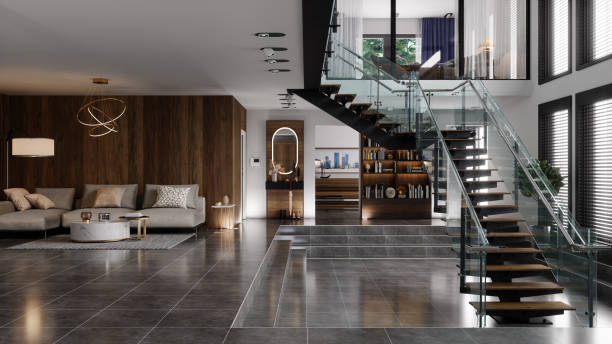luxury modern house interior with corner sofa, bookshelf and staircase - luxe stockfoto's en -beelden
