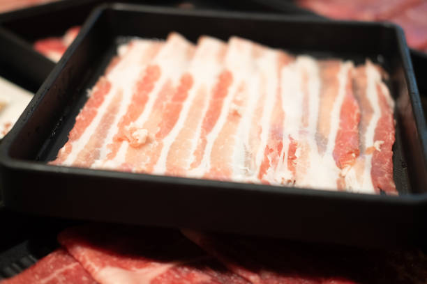 Sukiyaki fresh beef or pork slices served on black tray
