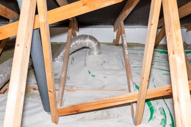 istock Pipe insulation with expanded perlite in domestic ventilation with energy recovery, a visible system of green pipes spread over the roof trusses. 1363820040