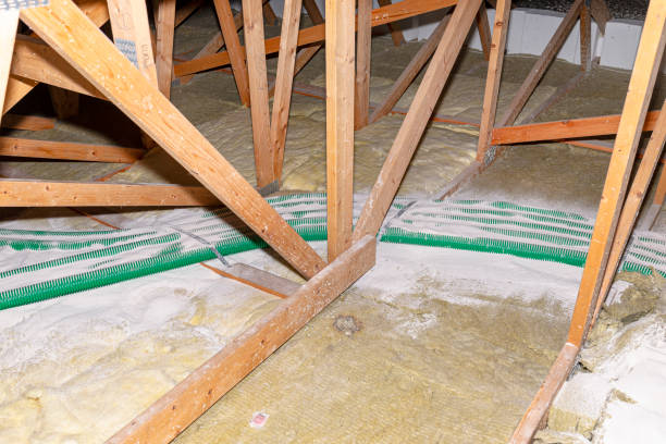 istock Pipe insulation with expanded perlite in domestic ventilation with energy recovery, a visible system of green pipes spread over the roof trusses. 1363820545