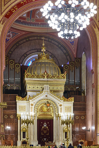 Amsterdam, The Netherlands: Portuguese Synagogue (the Esnoga) - an active Sephardic temple, built in the 17th-century - the Torah ark (Heikhal, or Aron Kodesh), with two tablets with the Ten Commandments engraved in Hebrew letters coated with gold - brass chandeliers with candles illuminate the temple.