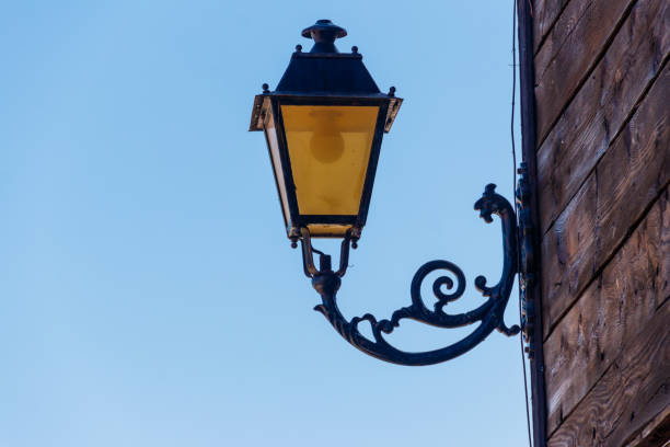 istock Vintage iron lantern on a house wall 1363822839