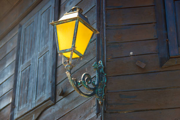 istock Vintage iron lantern on a house wall 1363822840