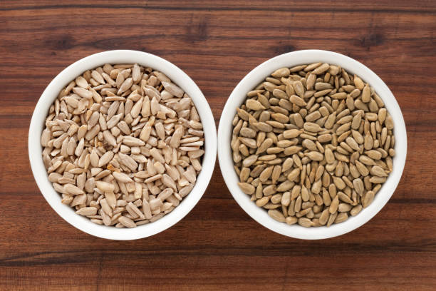 istock Raw and fried sunflower seeds 1363829090
