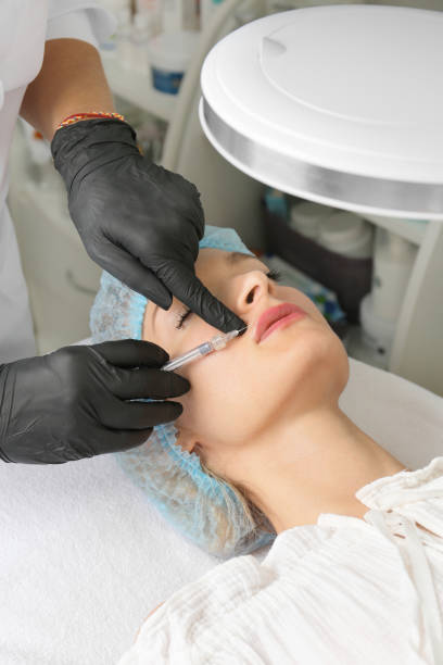 istock Lip augmentation in the beautician's office 1363830703