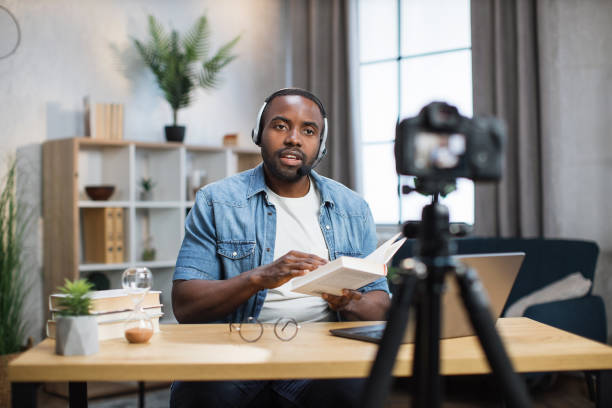 istock African man in headset recording online lesson at home 1363832429
