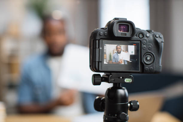 istock Male freelancer talking during online concefere at home 1363832504