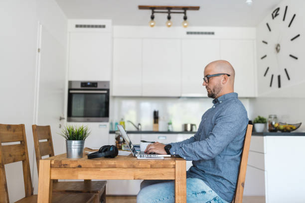 istock Man working from home during the coronavirus pandemic 1363833252