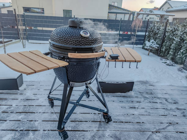 istock Large kamado type barbeque grill with wireless thermometer with probes inside 1363833832