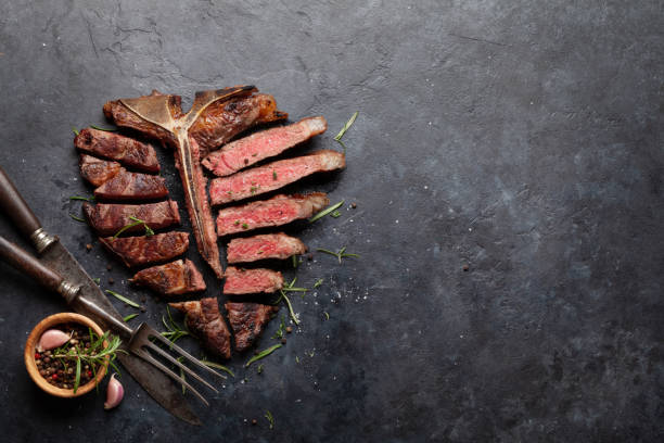 istock Grilled porterhouse beef steak. Sliced T-bone 1363842595