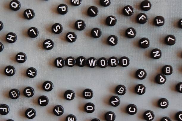 Alphabet beads with text KEYWORD stock photo