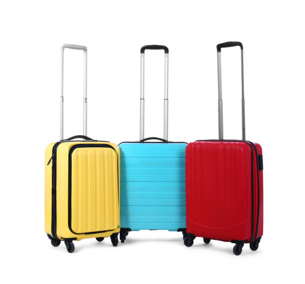 istock Stylish suitcases packed for travel on white background. Summer vacation 1363851982