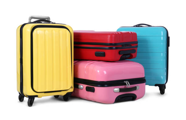 istock Stylish suitcases packed for travel on white background. Summer vacation 1363852328