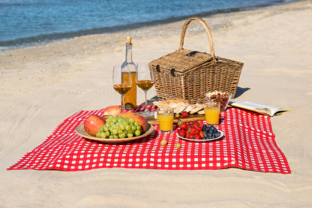 istock Food and drinks on beach. Summer picnic 1363852421