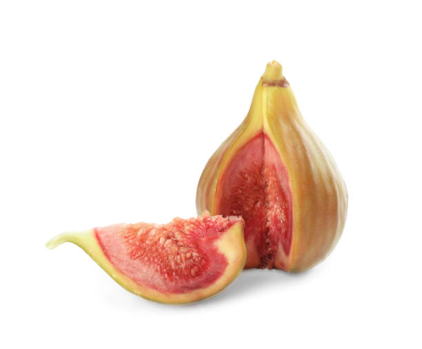 istock Tasty cut orange fig isolated on white 1363853057