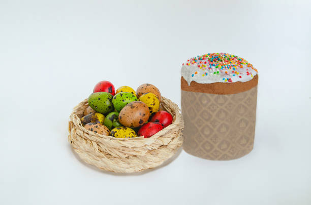 istock Quail eggs painted in different colors in a light wicker basket 1363853461