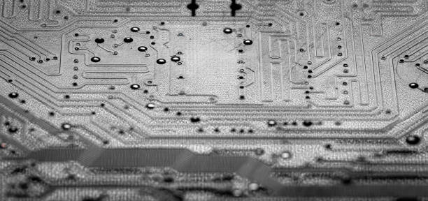 istock Macro Close up of printed wiring on PC circuit board 1363854494