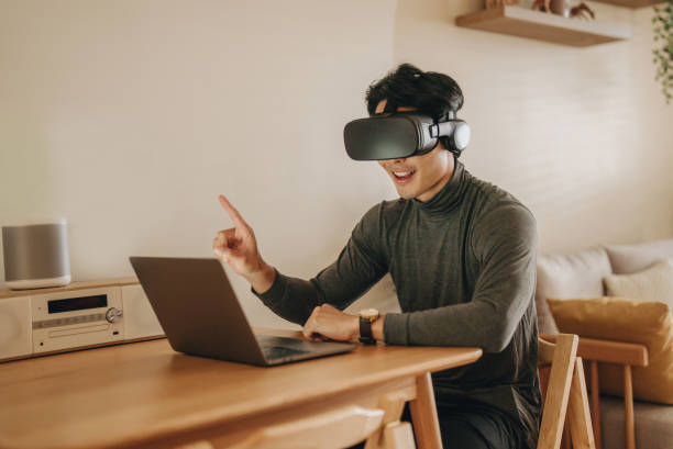 istock The Metaverse : Young man meeting with Virtual Reality at Home. 1363855092