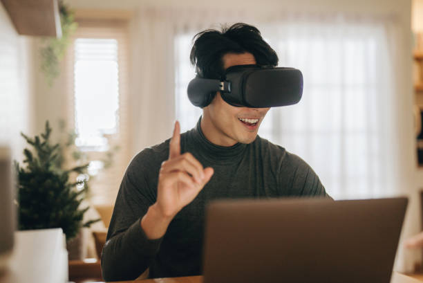 istock The Metaverse : Young man meeting with Virtual Reality at Home. 1363855099