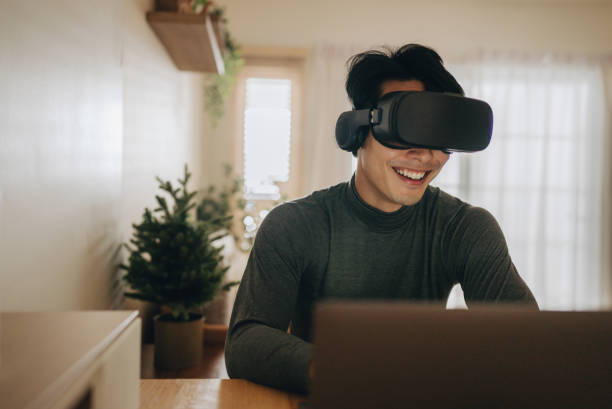 istock The Metaverse : Young man meeting with Virtual Reality at Home. 1363855109