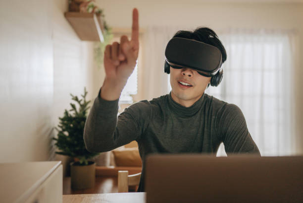 istock The Metaverse : Young man meeting with Virtual Reality at Home. 1363855114