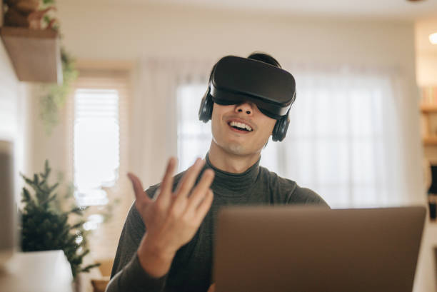 istock The Metaverse : Young man meeting with Virtual Reality at Home. 1363855121
