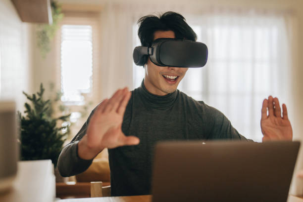 istock The Metaverse : Young man meeting with Virtual Reality at Home. 1363855154