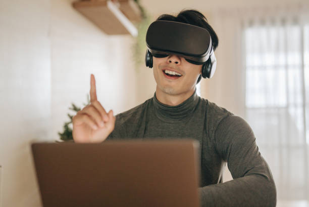 istock The Metaverse : Young man meeting with Virtual Reality at Home. 1363855178