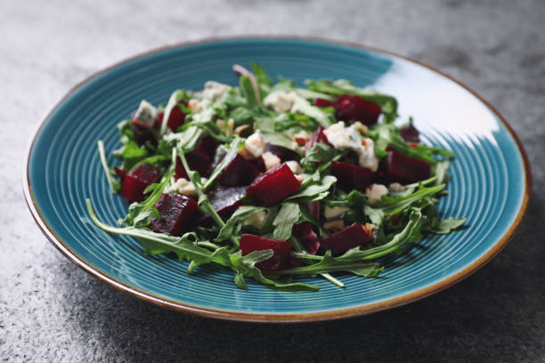 fresh delicious beet salad on grey table, closeup - beet common beet red food imagens e fotografias de stock