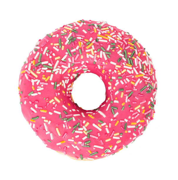istock Donut with colorful sprinkles isolated on a white background. Top view. 1363857209