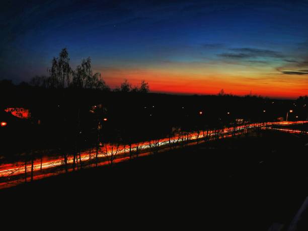 Long exposure time, light reflections, fast driving cars on the highway