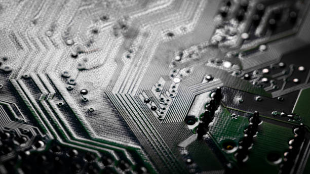 istock Macro Close up of printed wiring on PC circuit board 1363857712