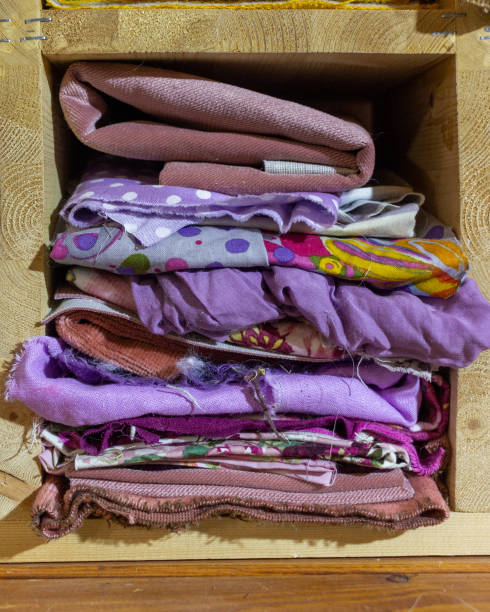 istock Multicolored textile fabrics on the shelves 1363860222