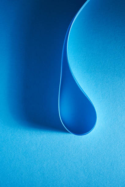 istock blue color strip wave paper. Abstract texture blue background 1363860283