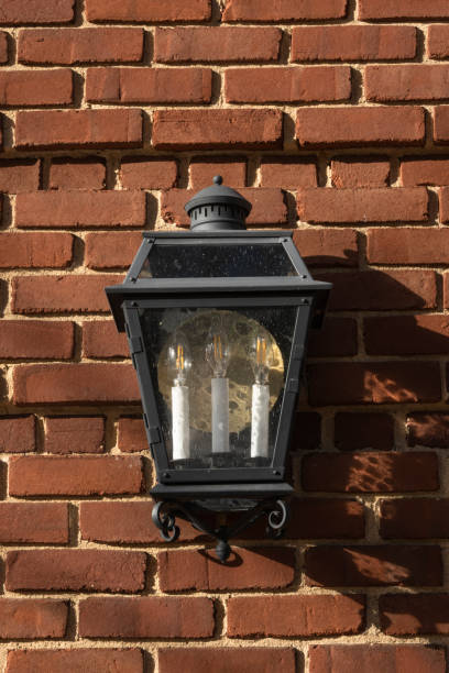 istock Street lamp on brick wall 1363860333
