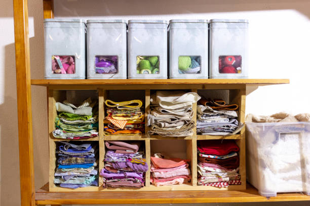 istock Multicolored textile fabrics on the shelves 1363860460