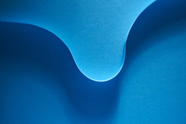 istock blue color strip wave paper. Abstract texture blue background 1363860502