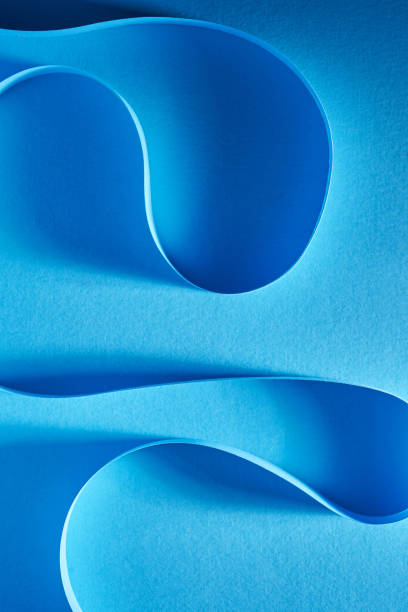 istock blue color strip wave paper. Abstract texture blue background 1363860504