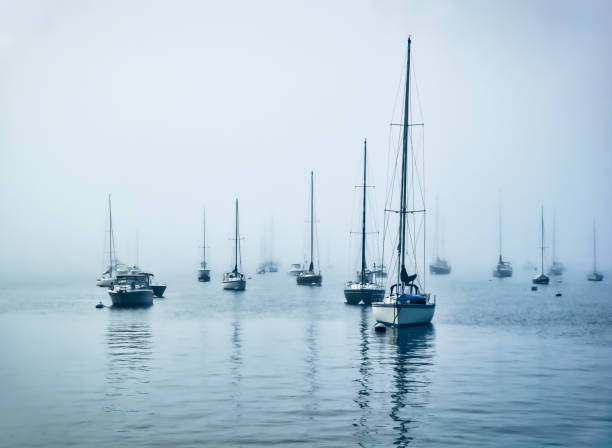 Sailboats in the Fog Sailboats in the Fog at Newport Harbor newport rhode island stock pictures, royalty-free photos & images