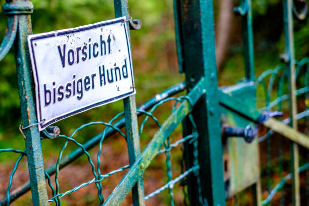beware of savage dog sign in germany - translation: beware of savage