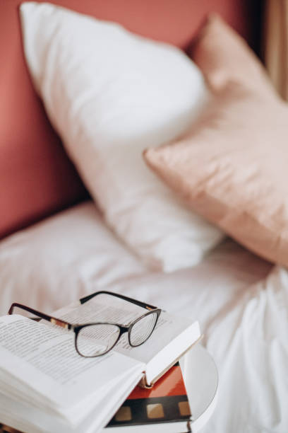 istock glasses book reading concept house bedroom pillows 1363867226