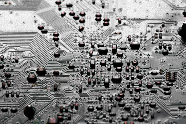 istock Close up of components and microchips on PC circuit board 1363867345