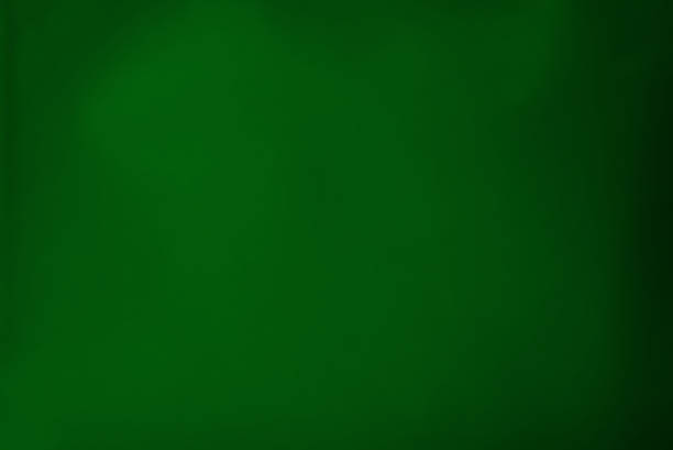 istock blur green abstract background, colored paper 1363868255