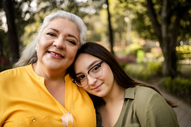 Close up portrait of mother and daughter stock photo